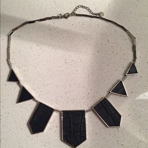 House Of Harlow embossed leather necklace.